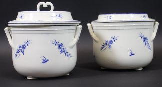 A pair of 19th Century French blue and white floral spray decorated ice pails with dished tops,