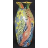 A Paul Jackson pottery vase of faceted wrythen baluster form decorated with nude studies and