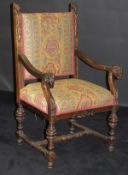 A late 19th Century continental carved oak hall chair,
