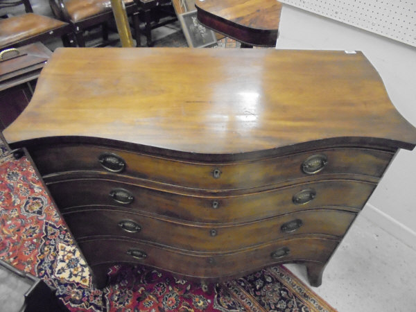 A George III serpentine fronted mahogany chest of four graduated drawers, - Image 2 of 18