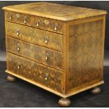 An oyster walnut and cross banded chest in the William and Mary taste,