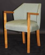 An Art Deco walnut framed bedroom chair in the manner of Dominique of Paris,