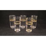 A set of five Gucci glasses with electro-plated bases and plated gold bound decoration to the