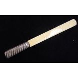 A silver-handled ivory paper knife / page turner (marks rubbed), approx 2.