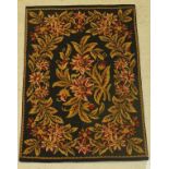 An English needle pattern panel, depicting floral sprays of green,