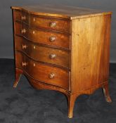 A Regency mahogany and inlaid serpentine chest of drawers,