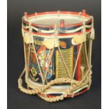 A George V painted brass model sized drum of the Scots Guards depicting Royal Arms and supporters