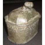 An 18th Century lead tobacco jar, the finial as a blackamoor head,