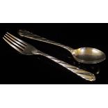 A pair of modern Italian silver salad servers comprising spoon and fork with stylised twisted