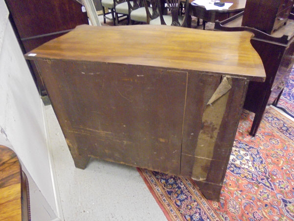 A George III serpentine fronted mahogany chest of four graduated drawers, - Image 18 of 18