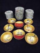 A Chinese famille rose porcelain soup set including bowls, spoons and stands,