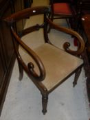 A set of five Victorian mahogany bar back dining chairs with carved scrolling decoration above