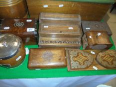 A selection of treen ware to include cigarette dispenser, desk tidy, tea caddy with domed top,