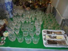 A selection of glass wares to include crystal tumblers, champagnes,