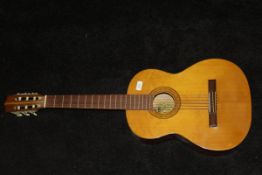 A Miyako 6-string Spanish guitar