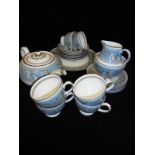 A Wedgwood turquoise "Florentine" pattern part tea service comprising teapot, cream jug, sugar bowl,