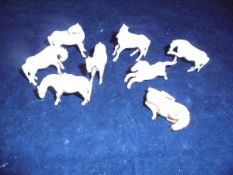 A set of eight Chinese carved ivory miniature horse ornaments from the Legend of Wang Mu
