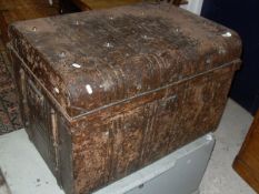 A tin domed top trunk