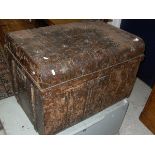 A tin domed top trunk