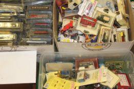 Two boxes of cars and one box of trains to include examples by Lesney, Lledo, Matchbox,