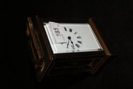 An early to mid 20th Century brass cased carriage clock