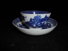 An 18th Century Caughley 'Fisherman with fish on a punt' tea bowl and saucer bearing Salopian 'S'