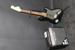 A Fender Squire "Strat" copy electric guitar (SN.