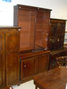 A mahogany and inlaid bookcase cabinet,