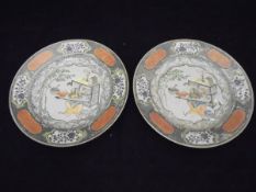 A pair of late 18th / early 19th Century Chinese polychrome decorated plates,