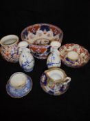 A collection of Chinese and Japanese china wares to include a pair of blue and white prunus blossom