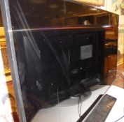 A Samsung 36" television with Sky digibox and a JVC DVD player,