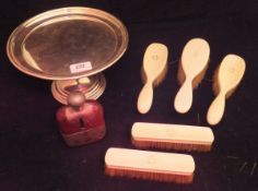 A collection of five early 20th Century ivory backed brushes,