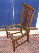 A set of eight early 20th Century mahogany framed dining chairs in the Chippendale taste with