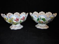 A pair of 19th Century Nove pottery faience monteiths decorated with cherries and plums,