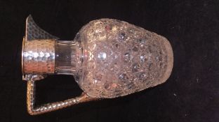 A Victorian silver mounted claret jug,