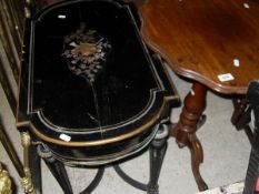A mahogany shaped top occasional table on baluster turned column to cabriole tripod base,