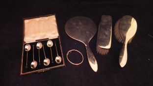 A cased set of six silver coffee bean spoons,