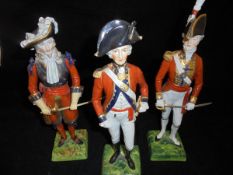 A collection of three Dresden Franklin Mint figures of military officers including Officer 3rd