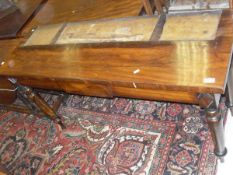 A Victorian rosewood hall table on four turned legs