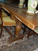 A pair of early 20th Century elm plank top serving tables with single piece tops,