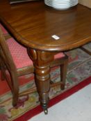 A Victorian mahogany extending dining table,