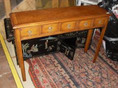 A walnut side table in the 18th Century style,