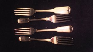 Four various silver table forks including one stamped "Brown" (Dublin,