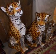 A set of three Italian pottery ornamental cheetah figures