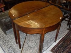 A pair of Victorian mahogany D-end table sections,