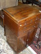 A 19th Century cupboard with applied moulded edge to the rectangular top above two short an two