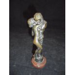 AFTER STELLA "Nude in embrace with statue of a satyr", a bronze with chocolate brown patination,