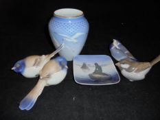 A Copenhagan porcelain Bing and Grondahl 681 blue fade vase featuring two birds,