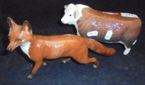 A Beswick figure of a Hereford bull in the form of a money box,