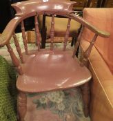A puce painted smoker's chair with spindle turned back, shaped seat,